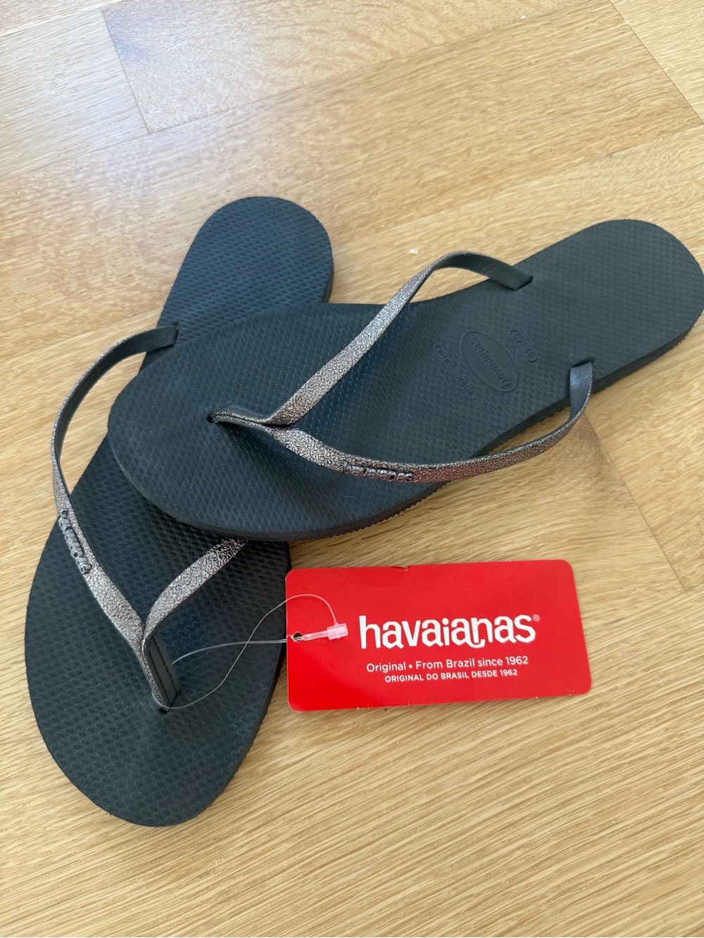 Havaianas Flip Flops in Black with Metallic Distressed Silver Straps